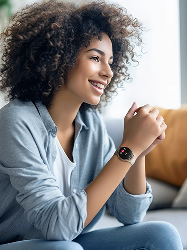 Happy woman wears a Hama "8900" Smart Watch