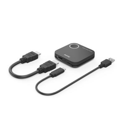 Black wireless display adapter on a white background